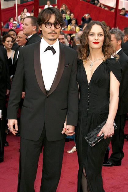 Johnny Depp”s long-time girlfriend Vanessa Paradis has banned him from